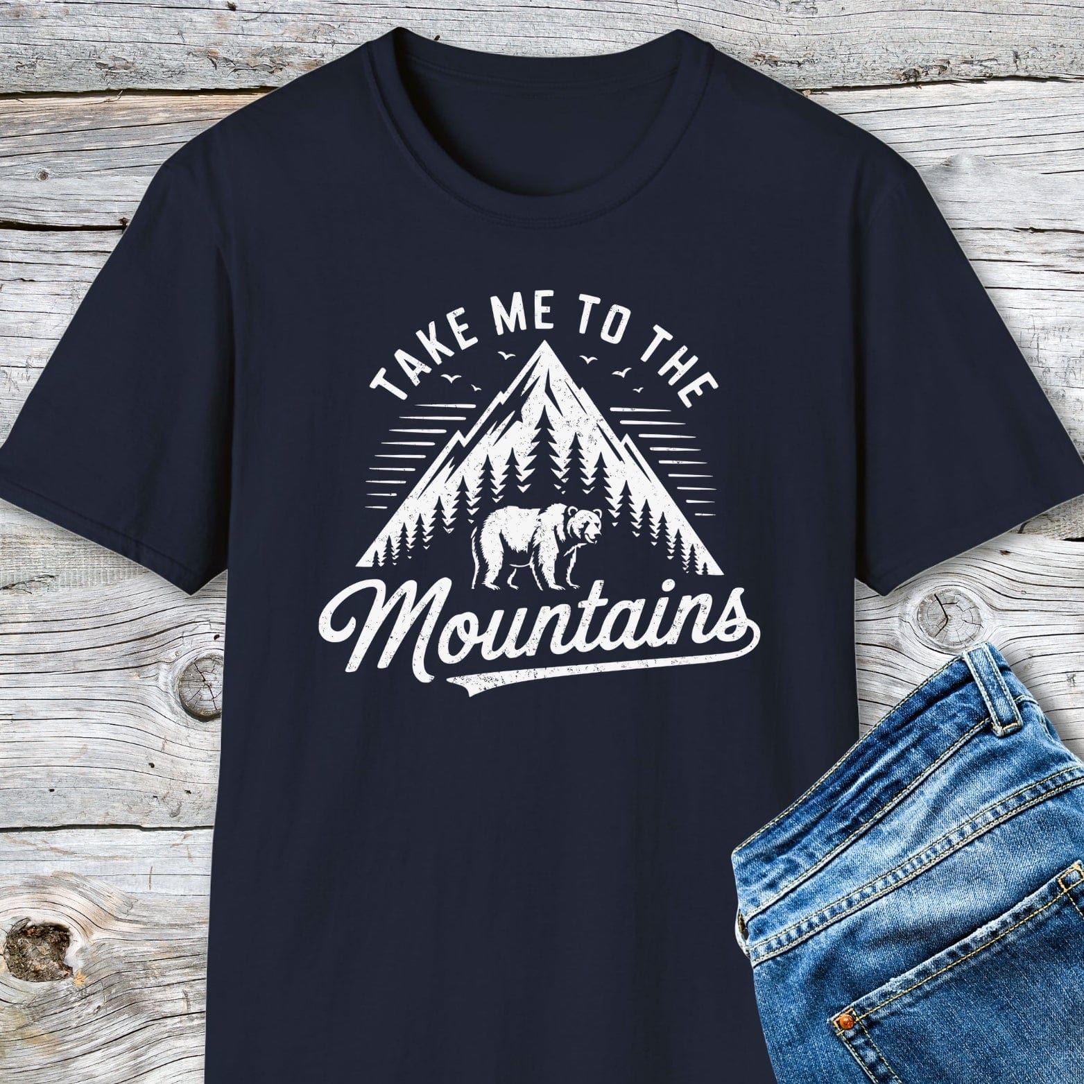 Take Me To The Mountains T-Shirt with mountain and bear print, perfect for adventures. Made of soft, lightweight cotton for comfort and movement.