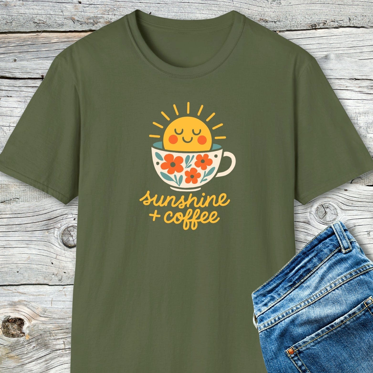Sunshine And Coffee T-Shirt featuring a coffee cup with floral design and a smiling sun, crafted from soft cotton for comfort and adventure-ready durability.