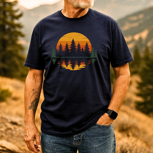 Man wearing Retro Sunset Pines T-Shirt, featuring stylized sunset with pine trees reflection. Made of soft cotton, designed for outdoor comfort and durability.