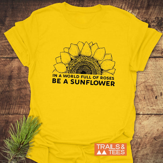 Be A Sunflower T-Shirt featuring a large sunflower design prominently displayed on the front, embodying an active and uplifting style.