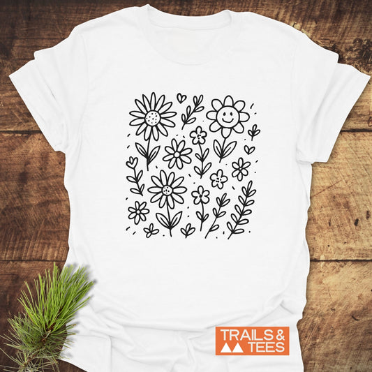 Wildflower Smiles T-Shirt featuring a black and white drawing of a flower, designed as an active shirt, ideal for casual wear.