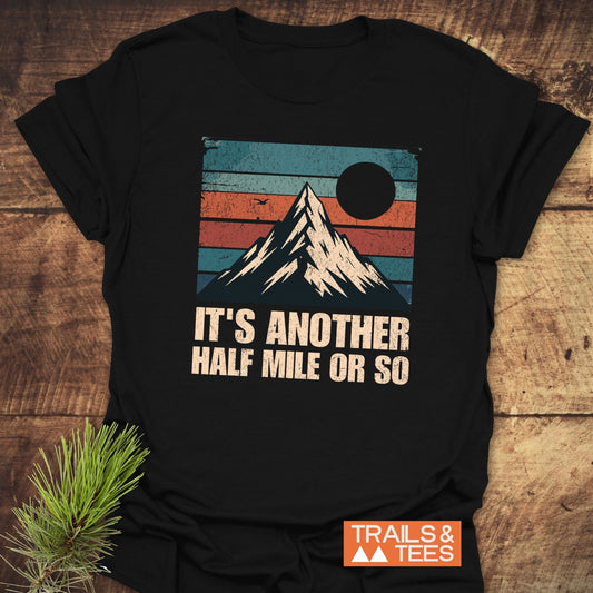 It's Another Half Mile Or So T-Shirt featuring a mountain and sun design, ideal for active wear.