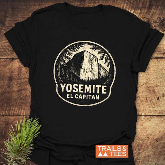 Yosemite El Capitan T-Shirt featuring a mountain and pine branch graphic, crafted from soft ring-spun cotton for everyday adventure and lasting comfort.