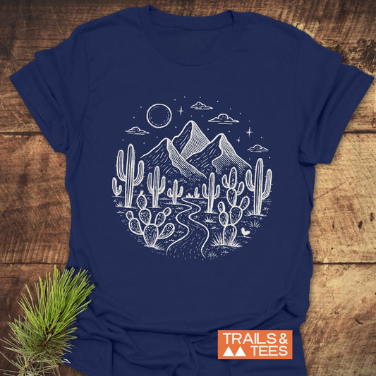 Desert Night T-Shirt featuring a durable print of a white cactus, designed for comfort and adventure with lightweight, pre-shrunk ring-spun cotton.