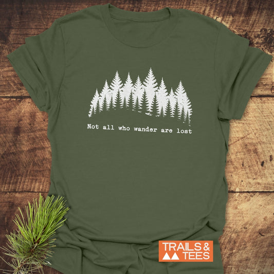 Not All Who Wander T-Shirt featuring durable white tree prints on soft, lightweight cotton, designed for comfort and adventure with taped shoulders and no side seams.
