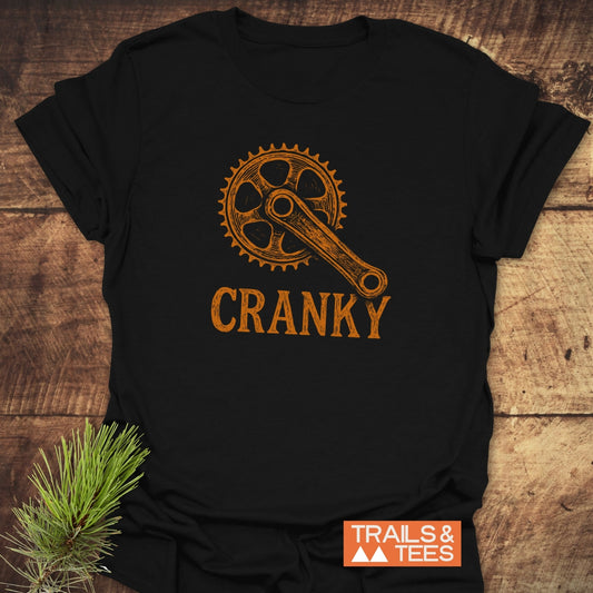 CRANKY T-Shirt featuring a prominent gear design, showcasing a close-up of the gear emblem. Ideal for active wear enthusiasts seeking unique clothing styles.