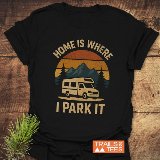 Home Is Where I Park It T-Shirt featuring a camper van and mountains, crafted from soft cotton with durable prints, ideal for outdoor enthusiasts.