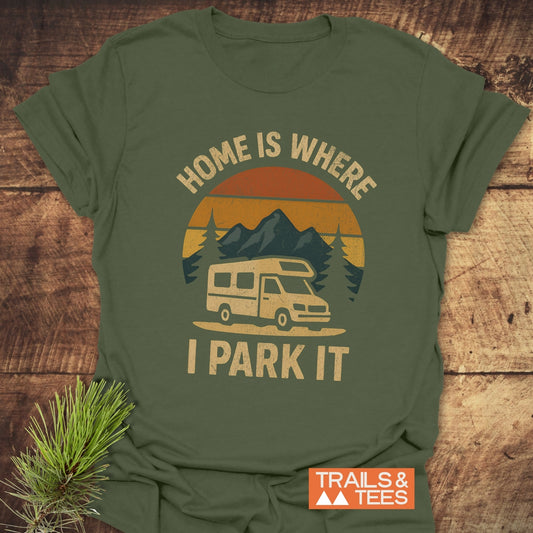 Home Is Where I Park It T-Shirt featuring a camper van, mountains, and pine branch, designed for comfort with durable prints and pre-shrunk fit.