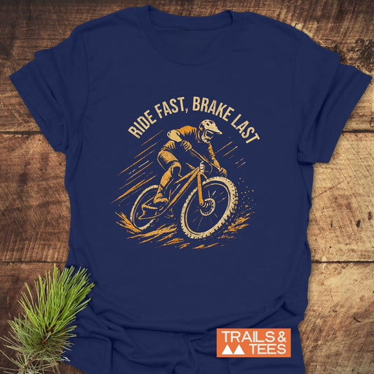 Ride Fast Brake Last T-Shirt featuring a print of a man cycling, highlighting its comfort and adventure-ready design for outdoor enthusiasts.
