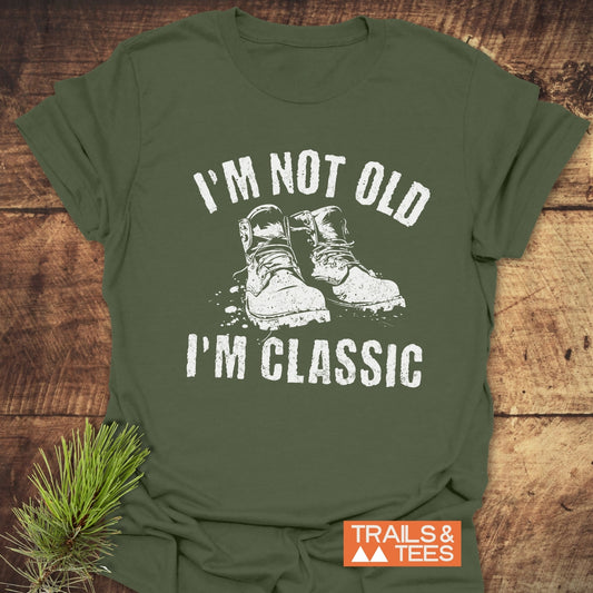 I'm Not Old I'm Classic T-Shirt with bold white text on a green shirt, perfect for showcasing a timeless, humorous style.
