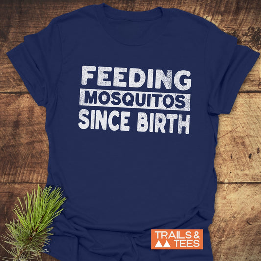 Feeding Mosquitos T-Shirt featuring durable white text on a soft blue fabric, designed for outdoor comfort, with taped shoulders and no side seams.