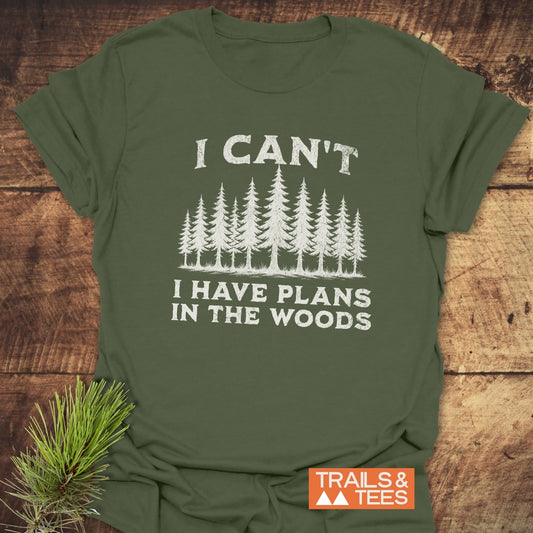 Green I Can't I Have Plans T-shirt, crafted from soft ring-spun cotton, featuring durable prints for outdoor enthusiasts, highlighting comfort and sustainability.