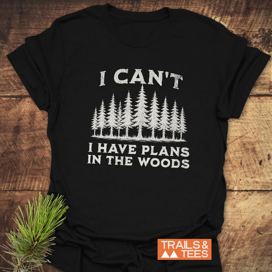I Can't I Have Plans T-Shirt, featuring durable white text on black, crafted from soft ring-spun cotton for outdoor adventures, pre-shrunk for reliable fit.