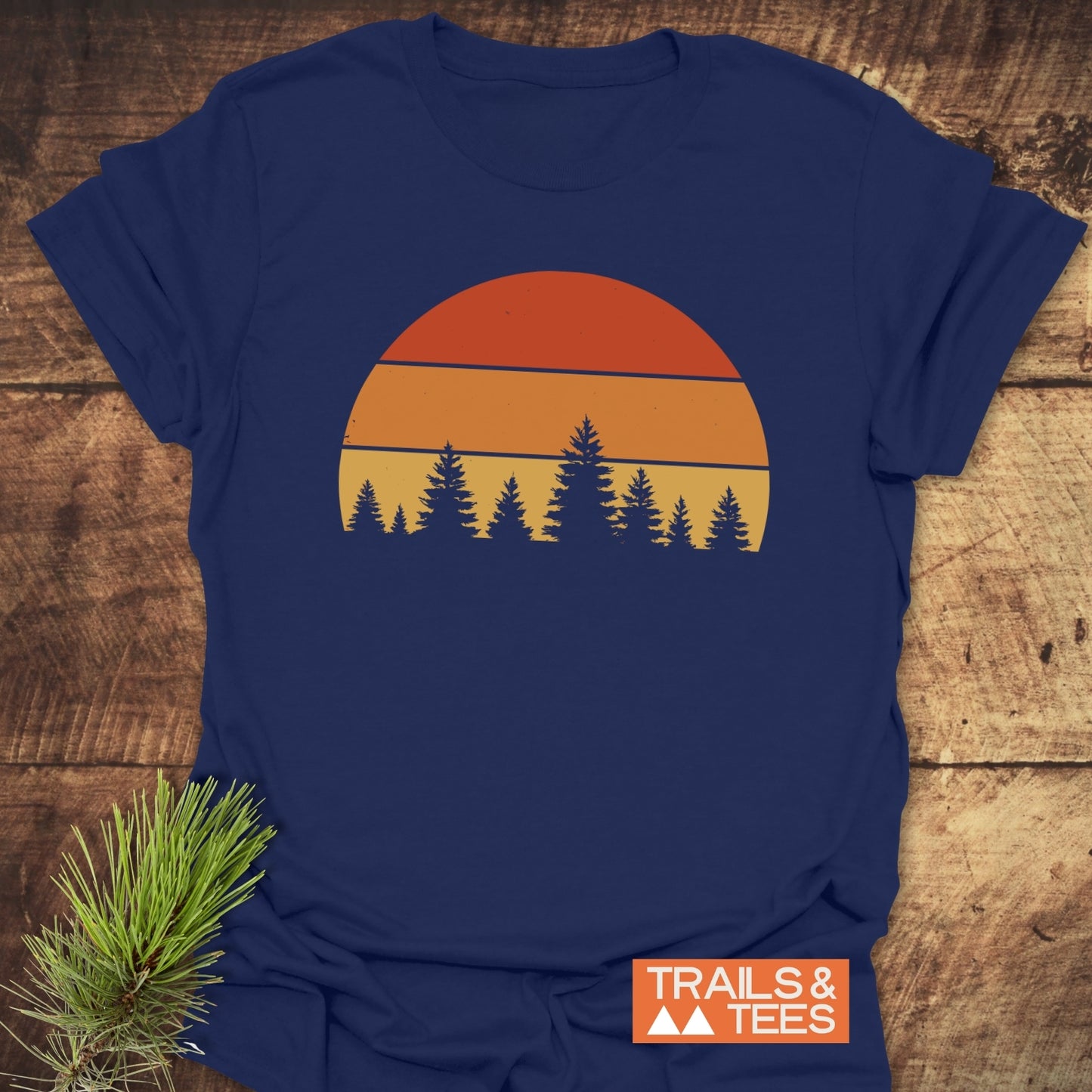Forest Sunset T-Shirt featuring a tree silhouette and orange circle design, made from lightweight cotton for comfort and durability, ideal for outdoor enthusiasts.