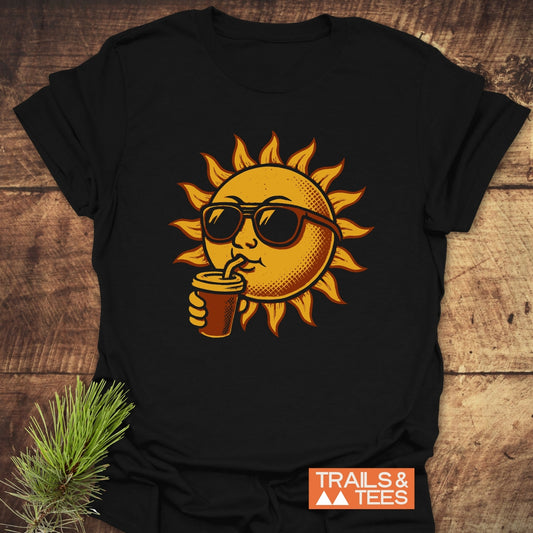 Sun With Coffee T-Shirt featuring a sun wearing sunglasses, sipping through a straw. Made of soft, ring-spun cotton for comfort and durability.
