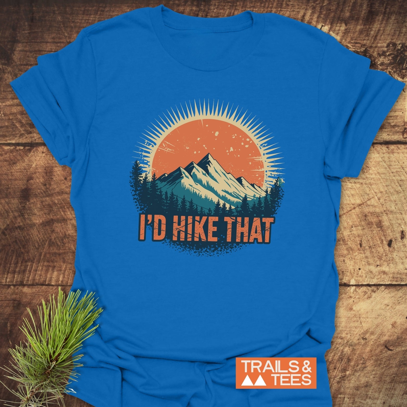 I'd Hike That T-Shirt featuring a mountain and sun graphic, designed for comfort with durable prints and pre-shrunk, ring-spun cotton for outdoor enthusiasts.