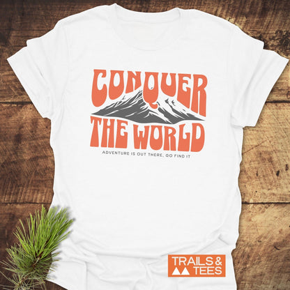 Conquer The World T-Shirt featuring red text and a pine branch design, offering an active, stylish look for everyday wear.