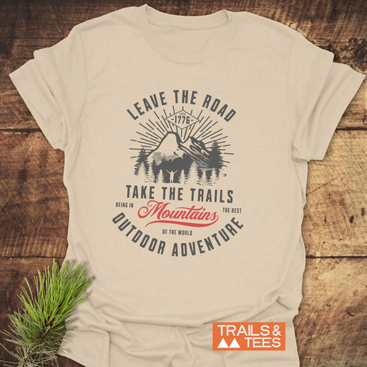 Leave The Road T-Shirt with a graphic design of a plant, showcasing text elements, perfect for active wear.