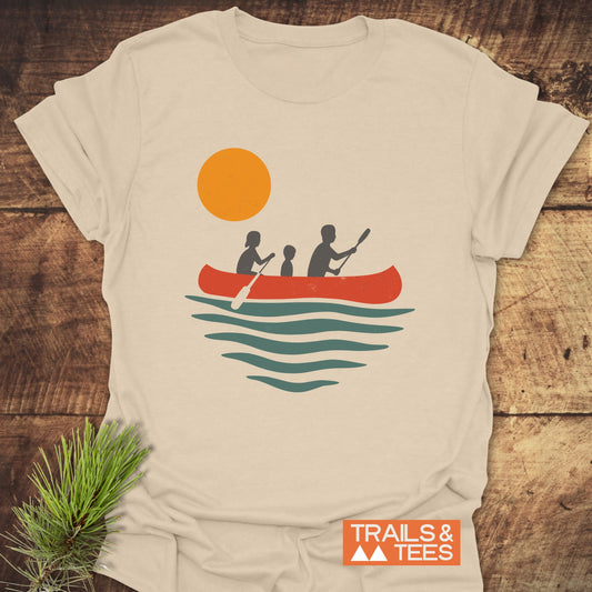 Family Canoe T-Shirt showcasing a silhouette of a boy with a paddle, highlighting durable DTF prints on soft, lightweight ring-spun cotton for outdoor enthusiasts.