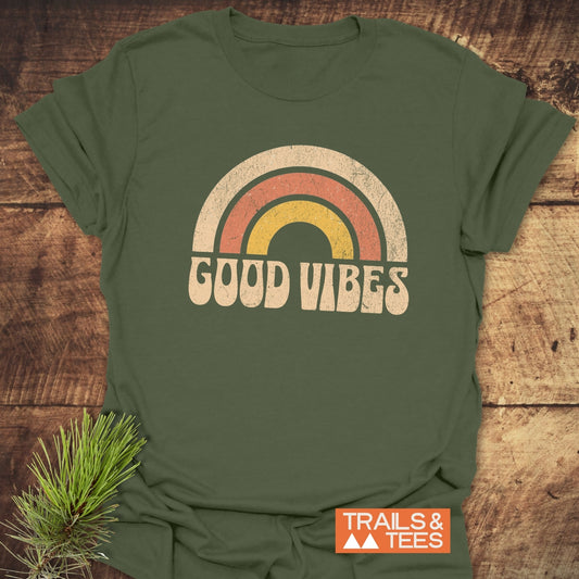 Good Vibes T-Shirt close-up, showcasing its soft, lightweight ring-spun cotton fabric, ideal for outdoor adventures. Durable DTF prints ensure lasting quality and fit.