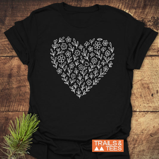 Flower Heart T-Shirt featuring durable DTF prints of white flowers and a heart on black, designed for outdoor comfort with pre-shrunk, lightweight cotton.