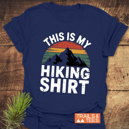 This Is My Hiking Shirt T-Shirt featuring bold white text on an active t-shirt, highlighting its suitability for outdoor adventures.