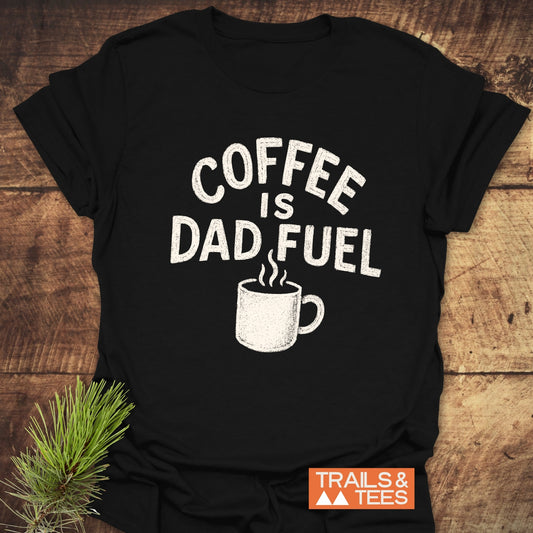 Coffee Is Dad Fuel T-Shirt, showcasing white text on a black tee, crafted from soft ring-spun cotton, ideal for everyday adventures and outdoor enthusiasts.