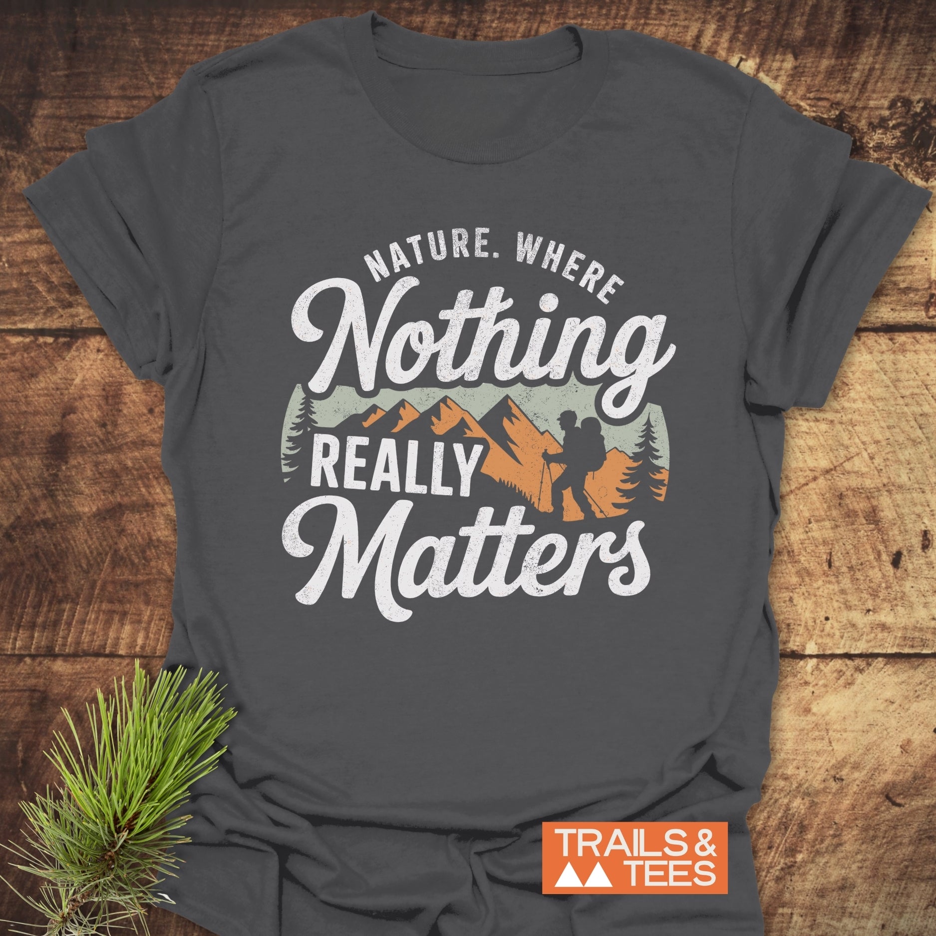 Nature. Where Nothing Really Matters T-Shirt, showcasing white text on a grey tee, crafted from soft, durable cotton for outdoor adventures, pre-shrunk for reliable fit.