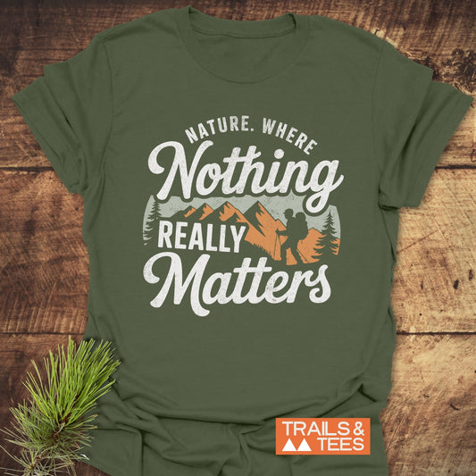 Close-up of the Nature. Where Nothing Really Matters T-Shirt, featuring white text on a soft, lightweight, pre-shrunk cotton fabric designed for outdoor enthusiasts.