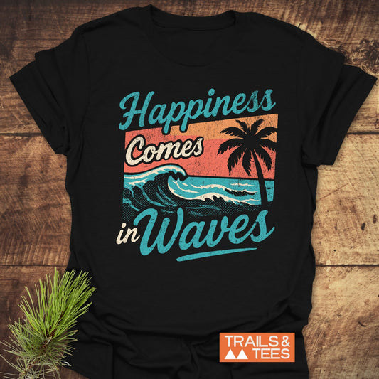 Happiness Comes In Waves Retro T-Shirt featuring a beach scene with sunset, wave, and palm tree, embodying adventure-ready comfort from Trails & Tees.