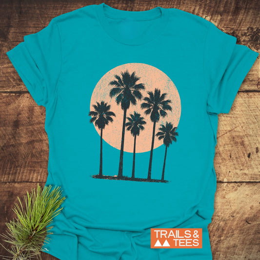 Palm Trees At Sunset T-Shirt featuring a silhouette of palm trees, crafted from soft ring-spun cotton, designed for comfort and outdoor adventures.