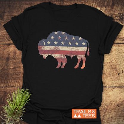 Land Of The Free Bison T-Shirt featuring a buffalo with stars and stripes, crafted from lightweight cotton for comfort and durability. Perfect for outdoor enthusiasts.