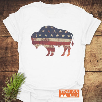 Land Of The Free Bison T-Shirt featuring a vibrant flag design, crafted from soft ring-spun cotton for comfort and durability, ideal for outdoor enthusiasts.