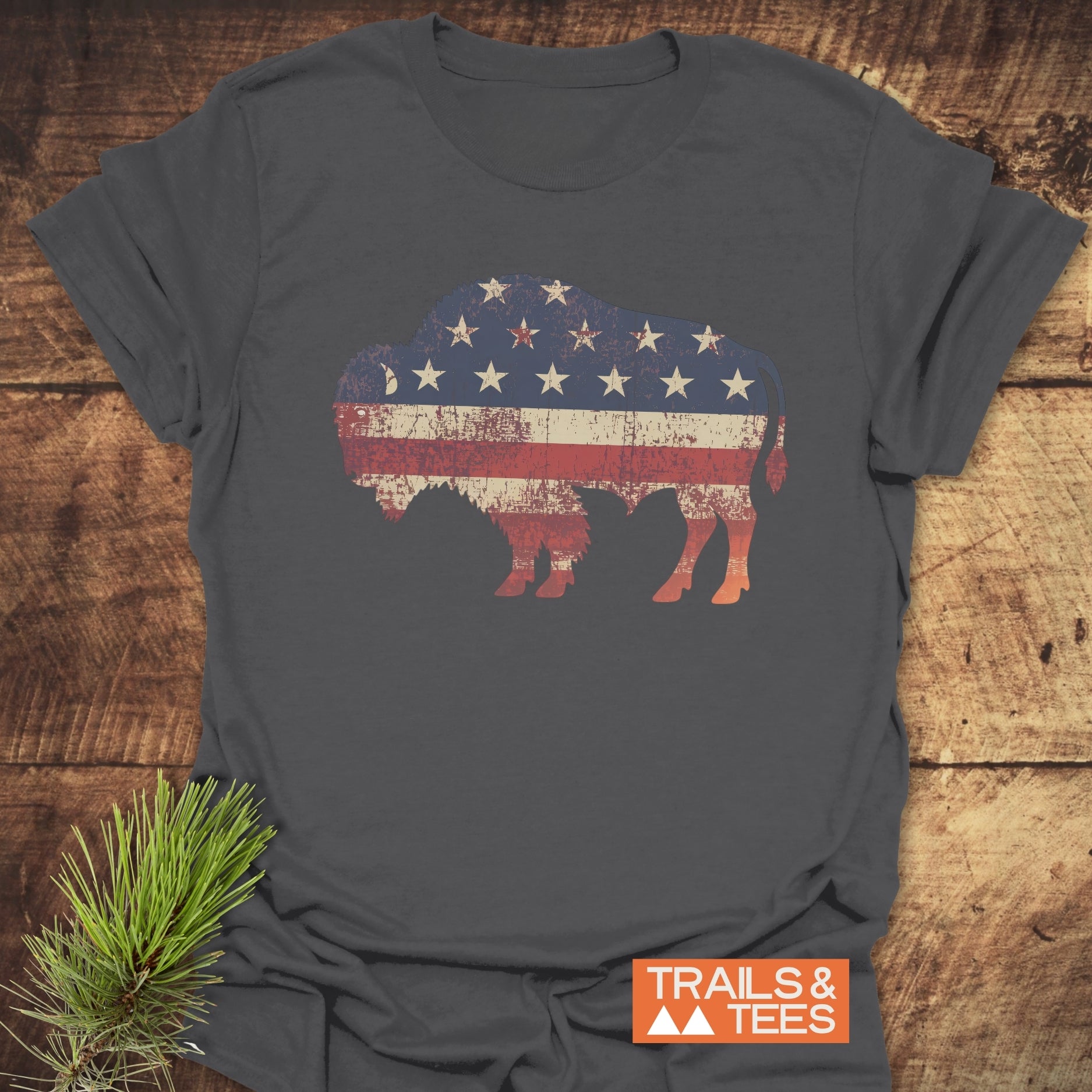 Land Of The Free Bison T-Shirt featuring a flag design, crafted from soft, lightweight cotton with durable prints, ideal for outdoor adventures and everyday comfort.