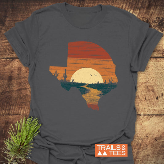 Texas Sunset T-Shirt featuring a Texas-shaped desert sunset graphic, crafted from soft, lightweight cotton for comfort, with durable prints and a reliable fit.