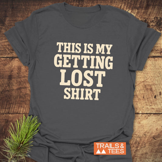 This Is My Getting Lost T-Shirt in charcoal-gray, featuring cream block letters and Trails & Tees logo, made from lightweight cotton for comfort and durability.