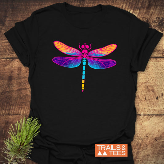 Psychedelic Dragonfly T-Shirt featuring a vibrant dragonfly graphic on soft, ring-spun cotton, ideal for outdoor adventures. Includes a TRAILS & TEES logo.
