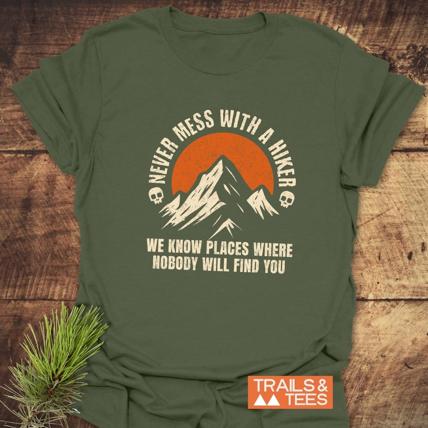 Never Mess With A Hiker T-Shirt featuring a mountain graphic and bold text, crafted from soft, durable cotton for outdoor enthusiasts.