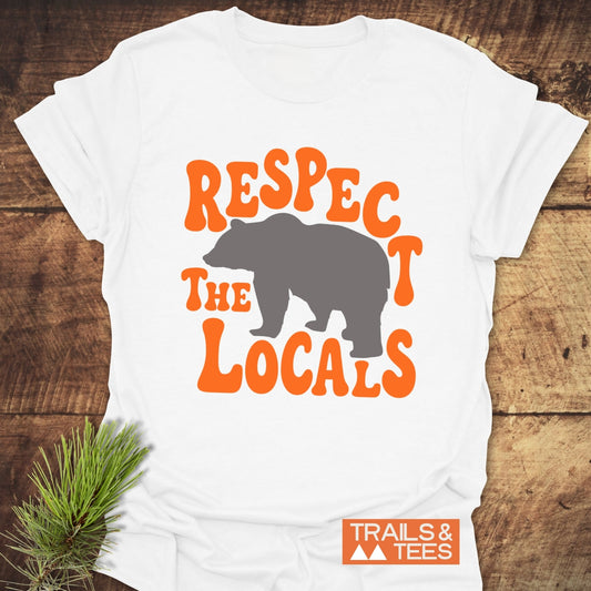 Respect The Locals Bear T-Shirt featuring bold orange lettering around a bear silhouette on soft cotton, designed for comfort and outdoor adventures.
