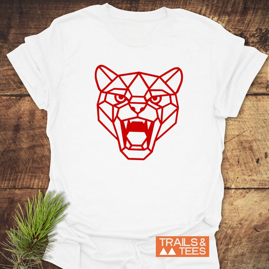 Geometric Cougar T-Shirt on rustic wood, featuring a red line-art big cat illustration. Includes TRAILS & TEES logo. Crafted for comfort and durability.