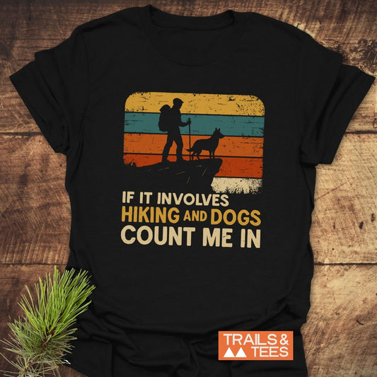 Hiking And Dogs T-Shirt featuring retro stripes, hiker and dog silhouette, crafted from soft cotton for comfort and durability, perfect for outdoor enthusiasts.