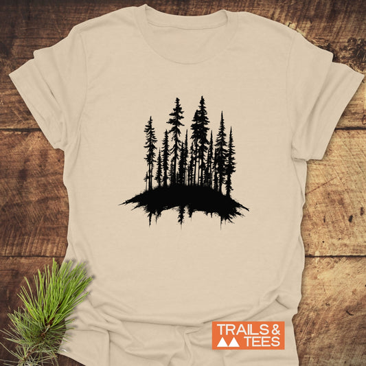 Woods Silhouette T-Shirt: Light-beige crew-neck with black pine tree design, crafted from soft cotton for comfort and durability, perfect for outdoor enthusiasts.