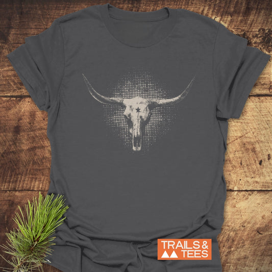 Buffalo Skull Texas T-Shirt features a longhorn skull graphic, emphasizing outdoor adventure with soft, durable cotton and a rustic pine branch accent.