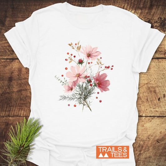 Wildflowers And Berries T-Shirt: White tee featuring a delicate floral design with pink cosmos blossoms, crafted for comfort and durability, embodying outdoor adventure spirit.