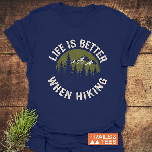 Life Is Better When Hiking T-Shirt with mountain and forest graphic, showcasing durable print on soft cotton, ideal for outdoor enthusiasts.