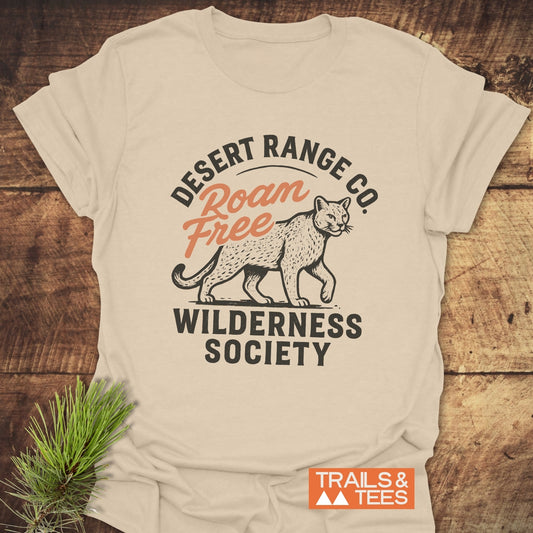 Roam Free Cougar T-Shirt featuring a mountain lion design and “DESERT RANGE CO.” text, highlighting adventure-ready, soft cotton crafted for outdoor enthusiasts.