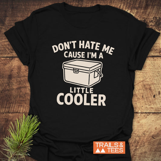A Little Cooler Camping T-Shirt with a cooler graphic and slogan. Made from soft, ring-spun cotton, featuring durable prints and taped shoulders for lasting shape.