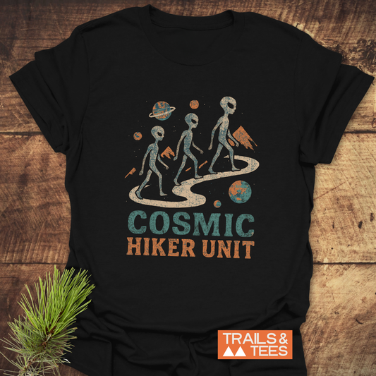 Cosmic Hiker Unit T-Shirt showing aliens hiking a cosmic trail, emphasizing adventure and comfort with durable, pre-shrunk cotton, perfect for outdoor enthusiasts.