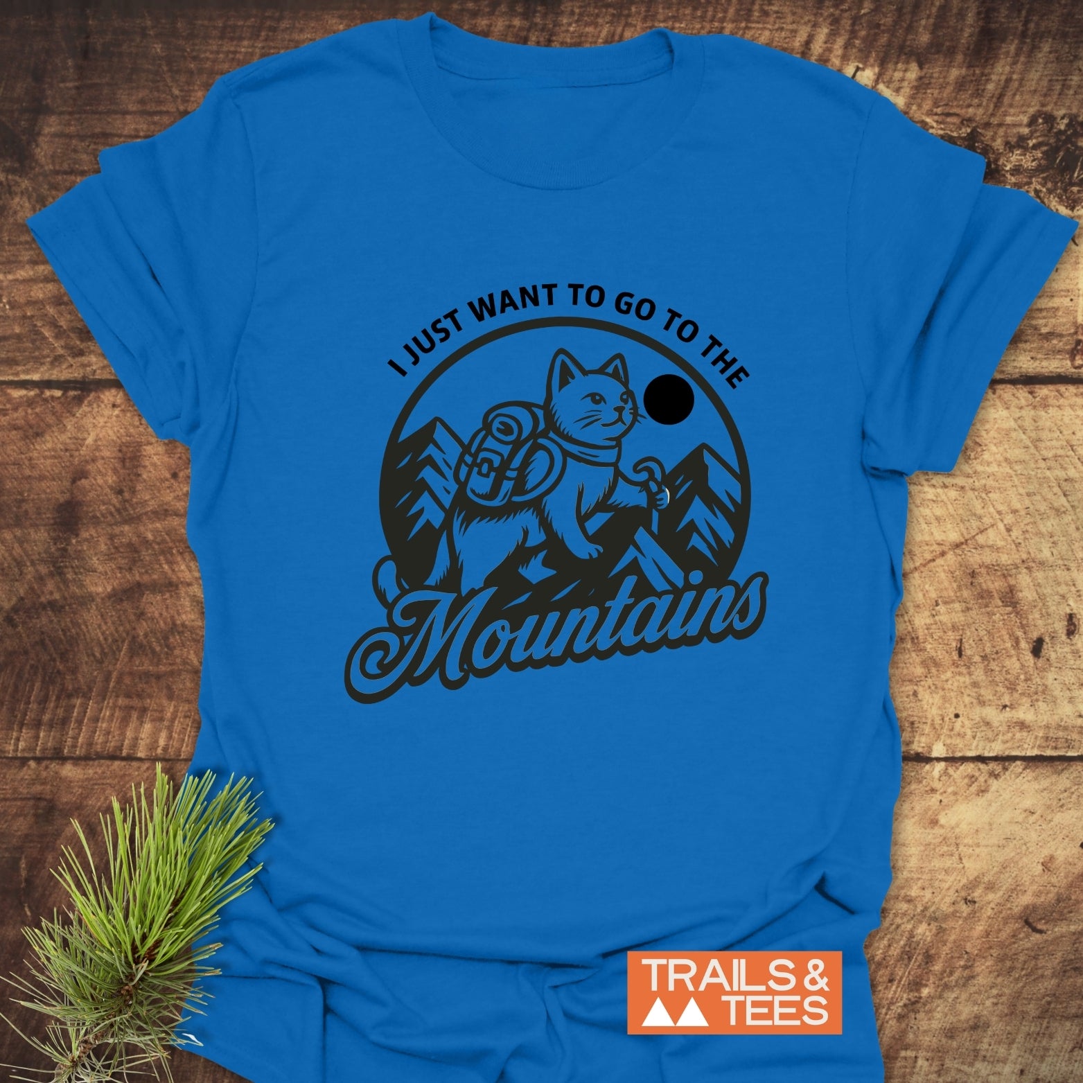 Mountain Kitty T-Shirt featuring a cat graphic with a backpack, ideal for outdoor enthusiasts. Crafted from soft cotton, ensuring comfort and durability for everyday adventures.