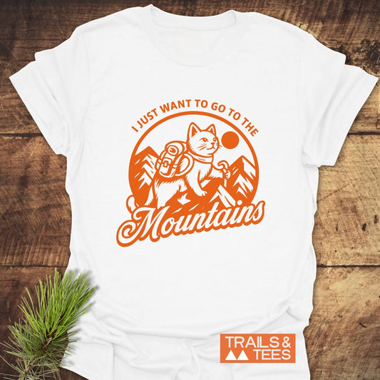 Mountain Kitty T-Shirt featuring a cat hiking graphic, crafted from soft cotton, designed for comfort and adventure. Pre-shrunk with durable print.